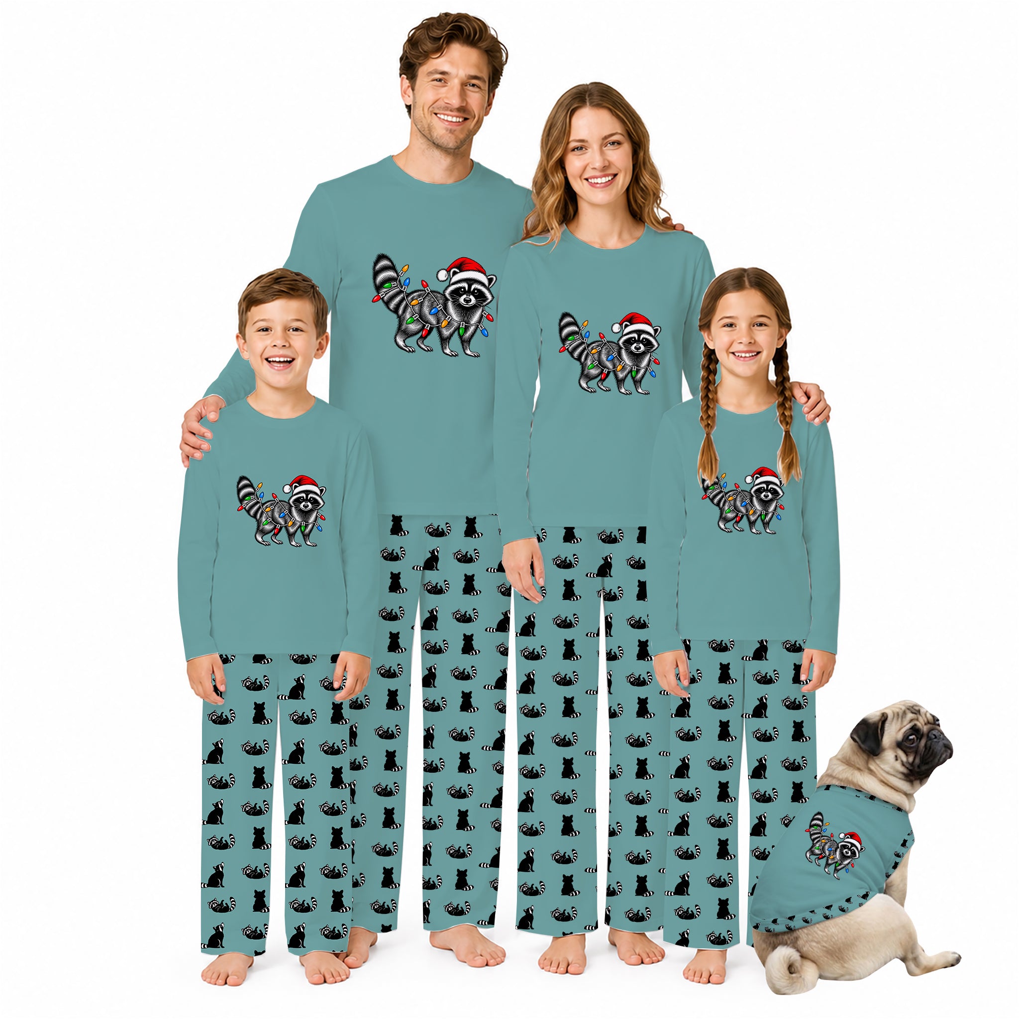 A family of four and a dog wearing matching teal long-sleeve pajamas with a raccoon and Santa hat graphic on the chest, photographed against a plain white background.