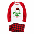 A two-piece holiday pajama set featuring a long-sleeve raglan top with red sleeves and a white body, printed with a 'Cousin Crew' graphic, and matching red and black plaid pajama pants, displayed on a clean white background.