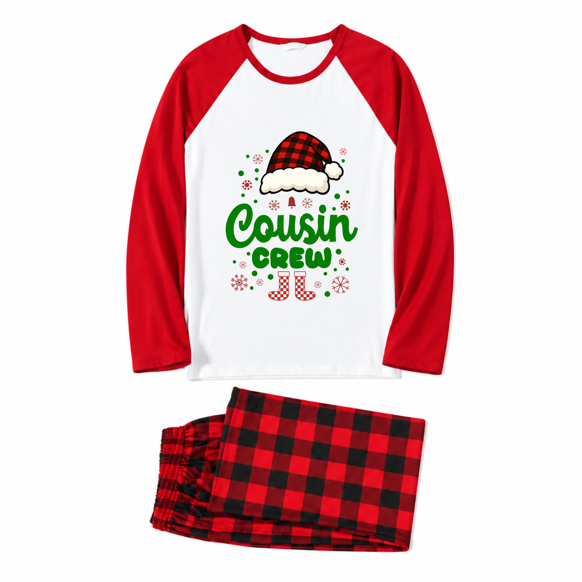 A two-piece holiday pajama set featuring a long-sleeve raglan top with red sleeves and a white body, printed with a 'Cousin Crew' graphic, and matching red and black plaid pajama pants, displayed on a clean white background.