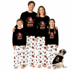 A family of four wearing matching black long-sleeve pajama tops and white patterned pajama pants, posed with a pug dog on a plain white background. Each person has a large football-themed graphic printed on the chest.