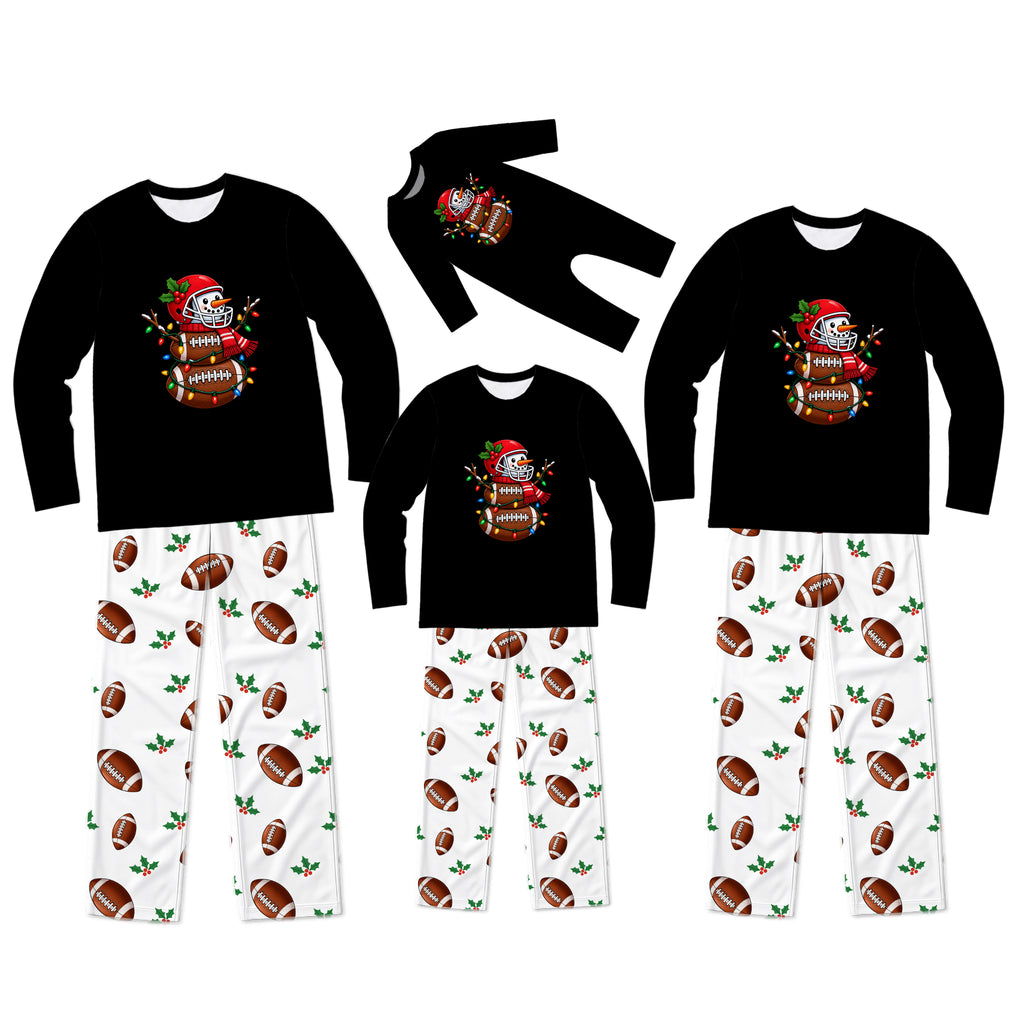 Three matching family long-sleeve pajama sets displayed on a white background, each with a black top featuring a cartoon football mascot graphic and white pants with an all-over brown football print.