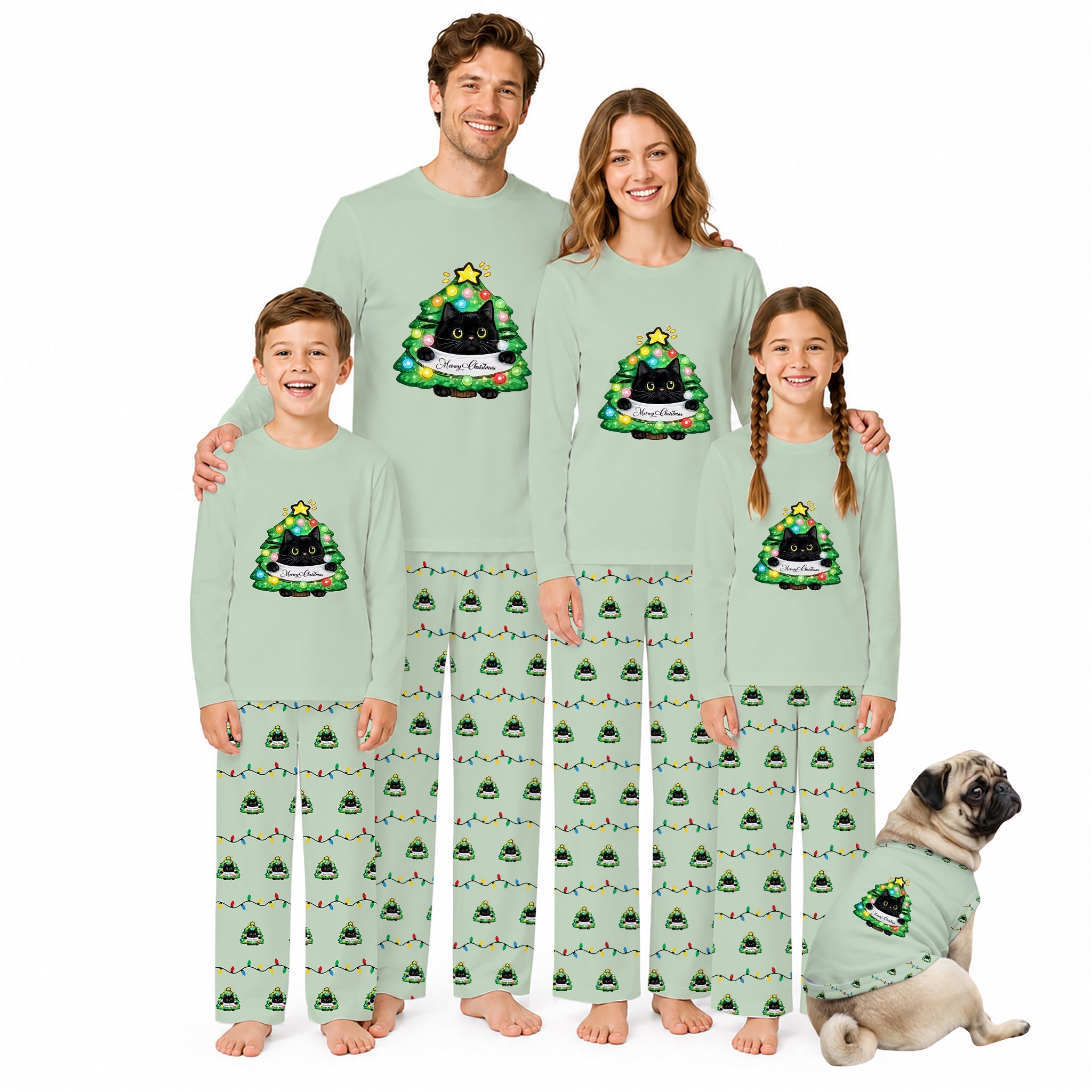 A family of five wearing matching sage Green long-sleeve pajamas with a Black cat in a Christmas tree pattern, standing together on a White background. A small pug dog wearing a matching pajama set sits in the lower right corner.