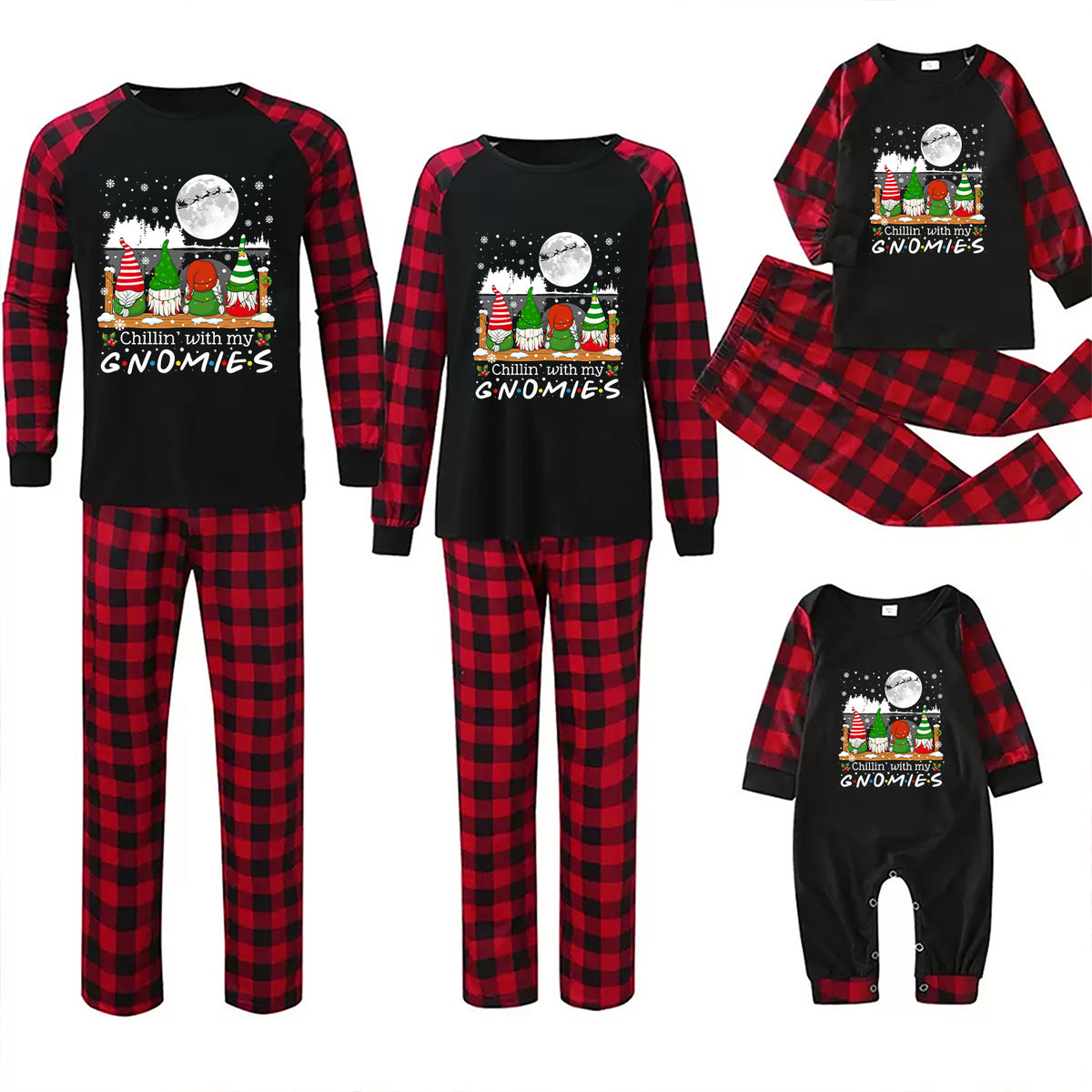 Three sizes of matching Christmas pajama sets shown on a white background: a large adult set, a medium set, and a baby set. Each set includes a black long-sleeve top with red buffalo plaid sleeves and a festive gnome graphic with the text 'MERRY CHRISTMAS ALL THE TIME GNOMIES' on the chest, paired with red and black buffalo plaid pajama pants.
