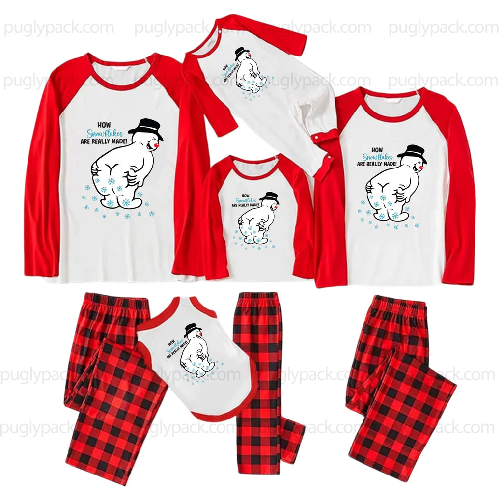 A 7-piece family pajama set for Father's Day, featuring raglan long-sleeve shirts and matching plaid or graphic pants in Red and White, with a polar bear graphic and text on the shirts.