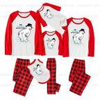 A 7-piece family pajama set for Father's Day, featuring raglan long-sleeve shirts and matching plaid or graphic pants in Red and White, with a polar bear graphic and text on the shirts.