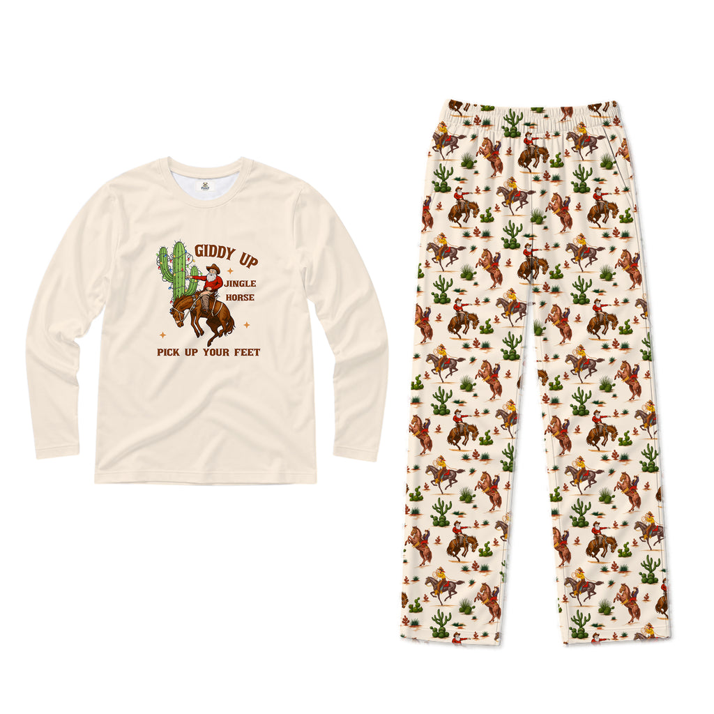 A two-piece kids' pajama set featuring a long-sleeve cream shirt with a western 'Giddy Up Jingle Horse' graphic and matching cream pants with an all-over cowboy and cactus print.