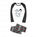 A two-piece raglan pajama set featuring a White and Black long-sleeve shirt with a snowman graphic and the text 'HOW SCENTIFACTS ARE REALLY MACHED,' paiRed with matching Black pants coveRed in a holiday snowflake and Red-Green pattern.