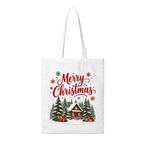 A white canvas tote bag with long handles, featuring a festive Christmas graphic on the front. The design includes the words 'Merry Christmas' in red cursive, surrounded by red and green snowflakes, above an illustration of a cozy snow-covered cabin surrounded by evergreen trees and wrapped gifts.