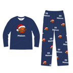 A two-piece custom sleepwear set consisting of a long-sleeve shirt and matching pants in navy blue. The shirt features a graphic of a basketball wearing a Santa hat with the name 'Maison' printed below.