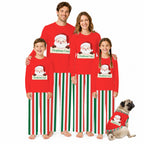 A family of four and a dog wearing matching red Christmas pajamas with Santa graphics and green and white vertical stripes, posed against a plain white background.