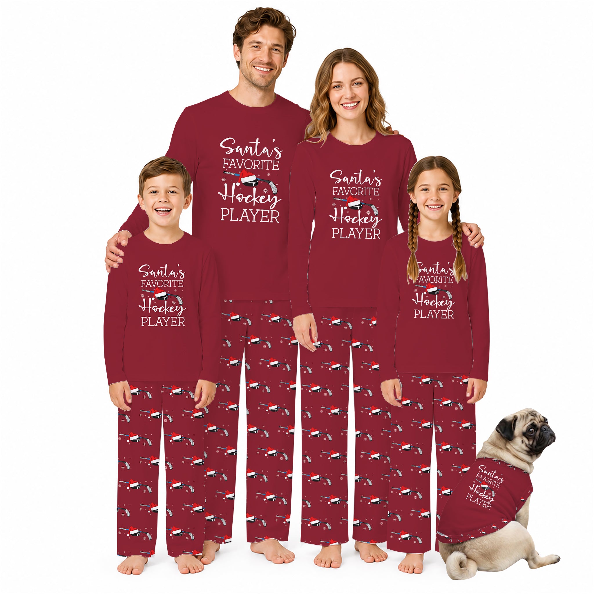 A family of four wearing matching burgundy long-sleeve pajamas with White text reading 'Santa's Favorite Hockey Player' and a hockey pattern on the pants, standing against a White background. A small pug dog sits at the bottom right wearing a matching pajama set.