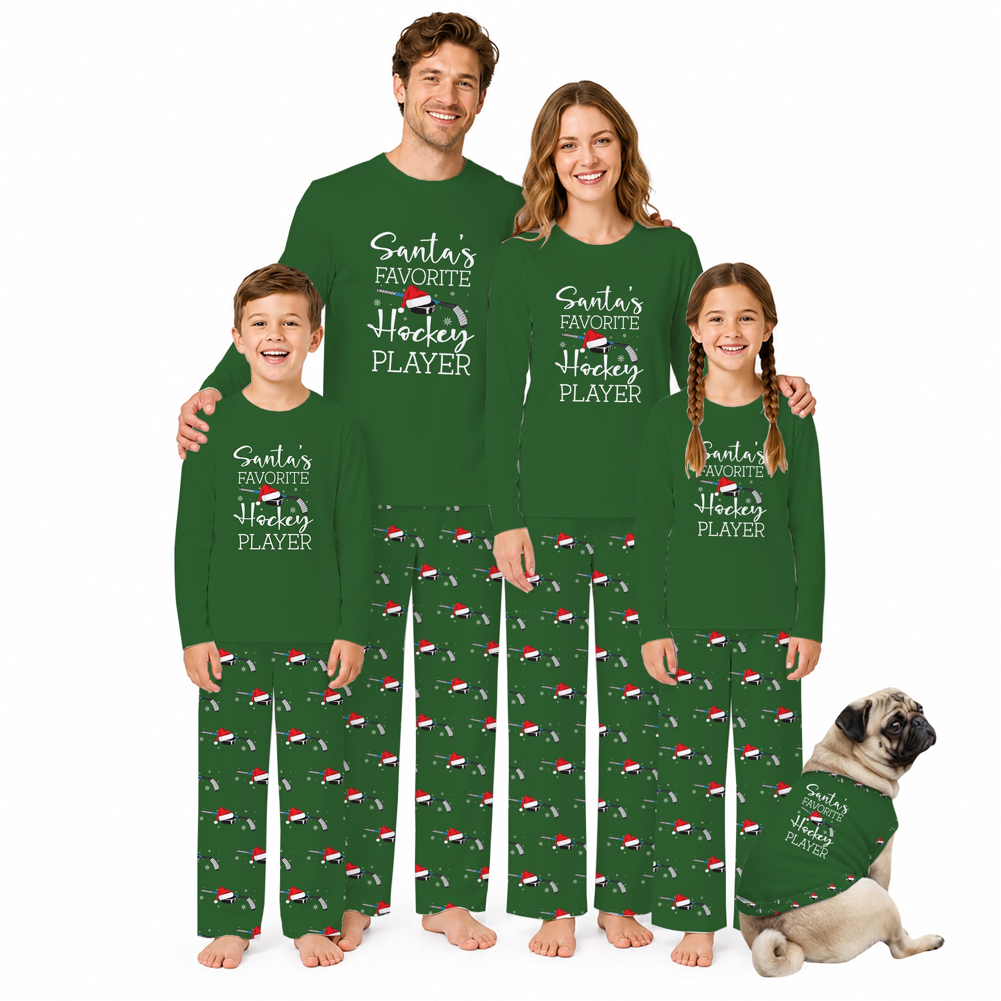 A family of four wearing matching Green holiday pajamas with White text reading 'Santa's Favorite Hockey Player' stands barefoot against a White background, with a small pug dog sitting beside them in matching pajamas.
