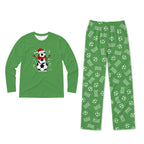 A two-piece holiday pajama set on a white background, featuring a dark green long-sleeve shirt with a gnome graphic and the text 'JUST HANGING WITH MY Gnomes' and matching dark green plaid pants.