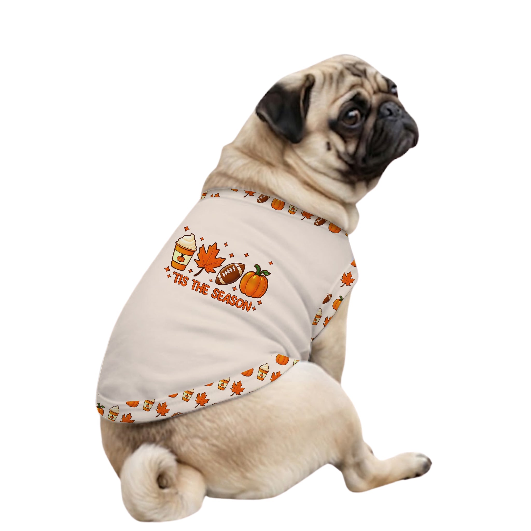 A fawn pug dog wearing a Cream-coloRed pet shirt with a fall-themed graphic that reads 'IT'S THE SEASON' with pumpkins, a football, a maple leaf, and a beer mug, set against a plain White background.